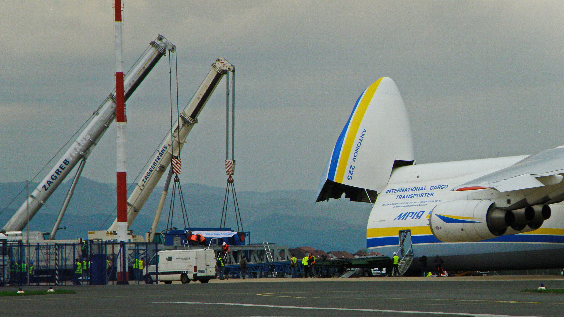 Antonov An-225 with its nose raised while oversized cargo is loaded